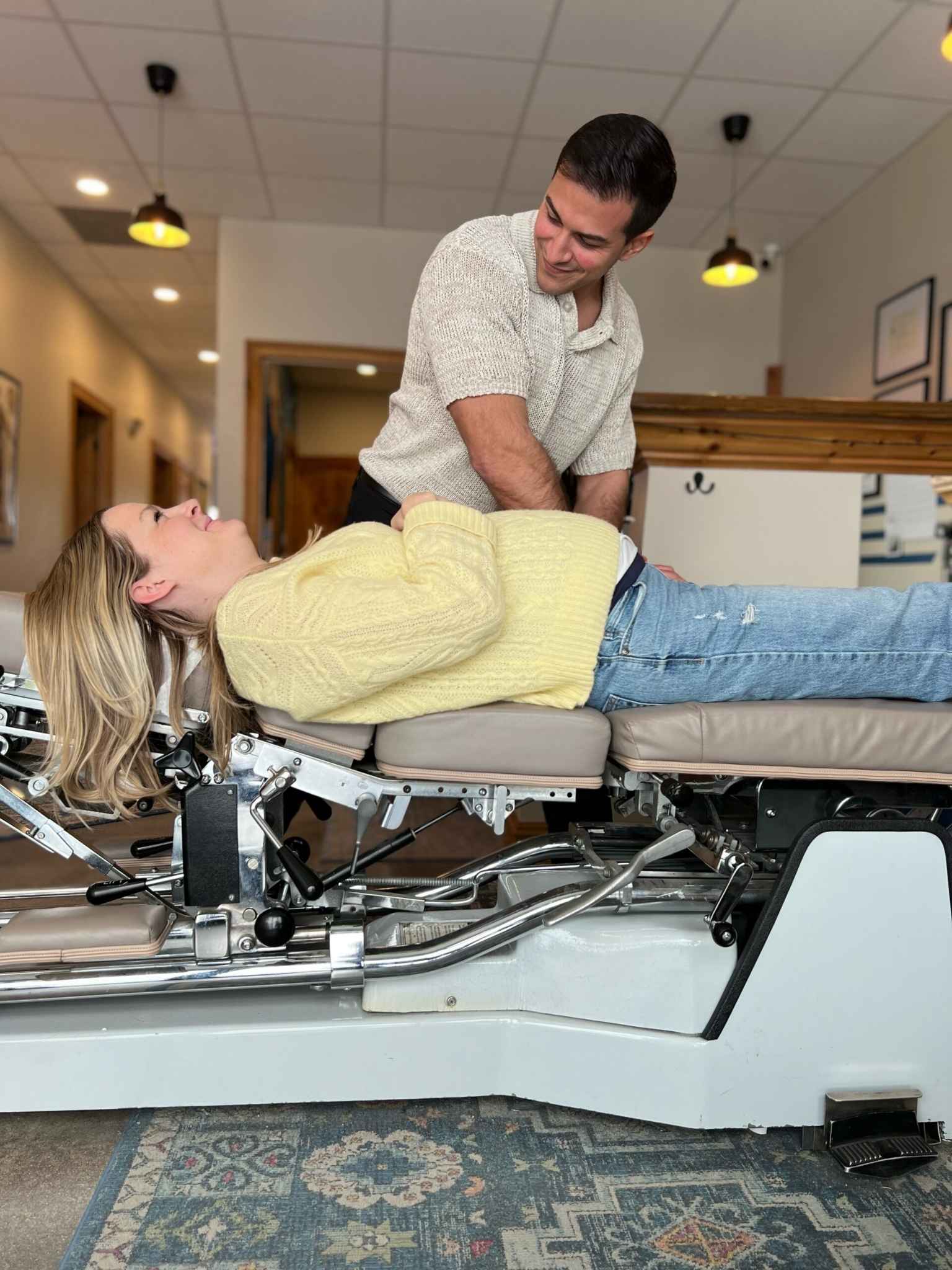 chiropractor in louisville co adjusting a pregnant mom 
